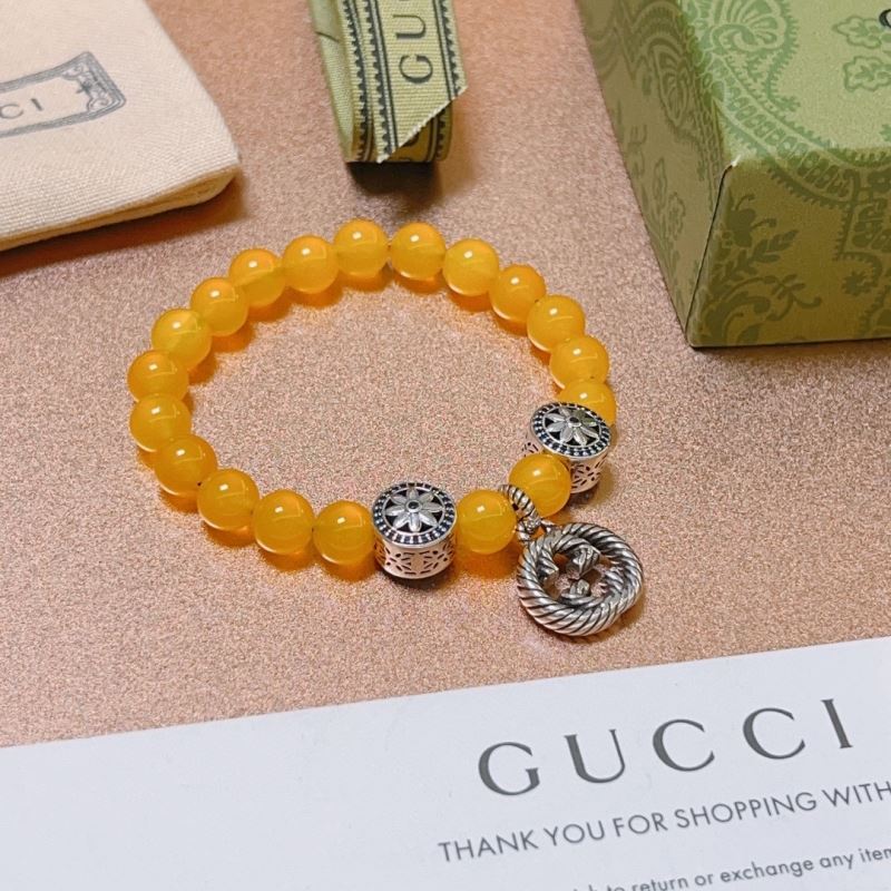 G*u*i bracelets